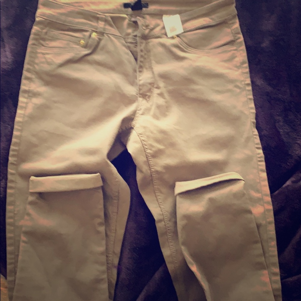 A tan colored skinny jean.